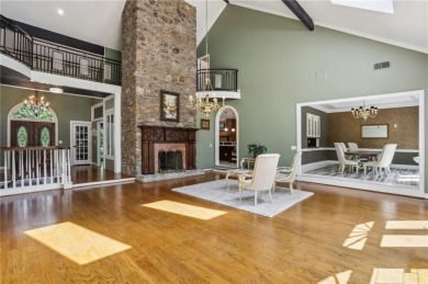 Tucked in Atlanta Country Club's quiet interior, this European on Atlanta Country Club in Georgia - for sale on GolfHomes.com, golf home, golf lot