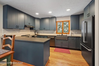 Very attractive and popular four bedroom Timber Trails home on on Lake Naomi Timber Trails Golf Club in Pennsylvania - for sale on GolfHomes.com, golf home, golf lot