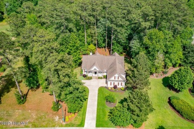 Enjoy elegance on the fairway in this stunning home tucked away on Carolina Colours Golf Club in North Carolina - for sale on GolfHomes.com, golf home, golf lot