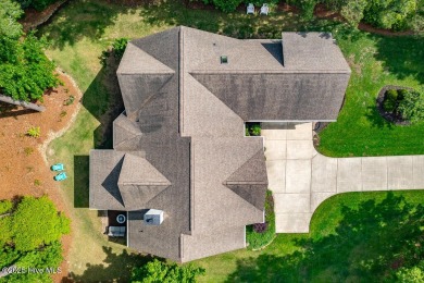 Enjoy elegance on the fairway in this stunning home tucked away on Carolina Colours Golf Club in North Carolina - for sale on GolfHomes.com, golf home, golf lot