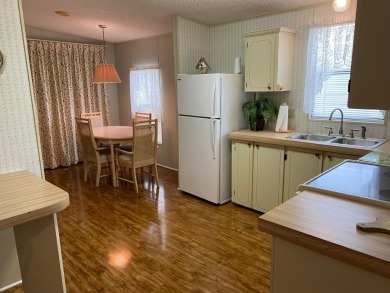 Enjoy the Florida lifestyle in this Fully Furnished - Turn Key on Spanish Lakes Fairways in Florida - for sale on GolfHomes.com, golf home, golf lot