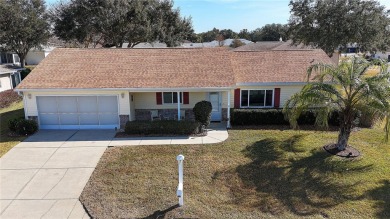 Well maintained ranch styled home is located closer to the front on Eagle Ridge At Spruce Creek Country Club in Florida - for sale on GolfHomes.com, golf home, golf lot