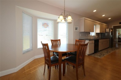 Well maintained ranch styled home is located closer to the front on Eagle Ridge At Spruce Creek Country Club in Florida - for sale on GolfHomes.com, golf home, golf lot