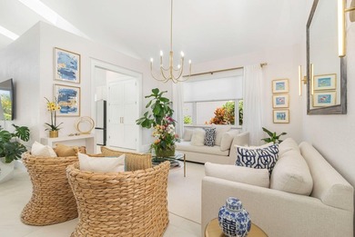 Nestled within a prestigious, gated community, this model on Ironhorse Country Club in Florida - for sale on GolfHomes.com, golf home, golf lot