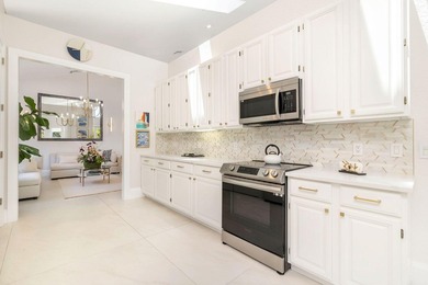 Nestled within a prestigious, gated community, this model on Ironhorse Country Club in Florida - for sale on GolfHomes.com, golf home, golf lot