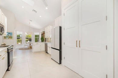 Nestled within a prestigious, gated community, this model on Ironhorse Country Club in Florida - for sale on GolfHomes.com, golf home, golf lot