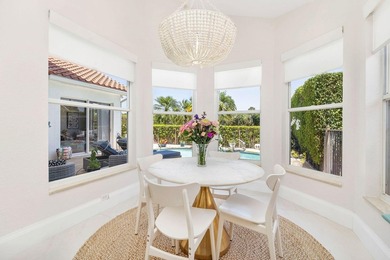 Nestled within a prestigious, gated community, this model on Ironhorse Country Club in Florida - for sale on GolfHomes.com, golf home, golf lot