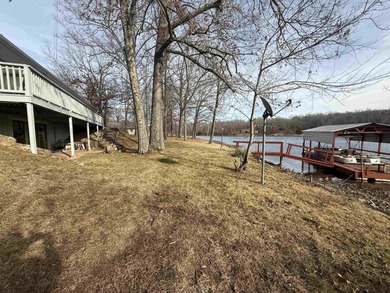 This charming 3-bedroom, 2.5-bath home sits on Lake Omaha in on Cherokee Village South Course in Arkansas - for sale on GolfHomes.com, golf home, golf lot
