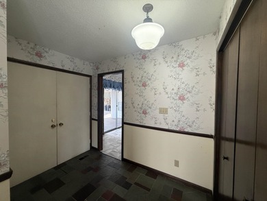 This charming 3-bedroom, 2.5-bath home sits on Lake Omaha in on Cherokee Village South Course in Arkansas - for sale on GolfHomes.com, golf home, golf lot