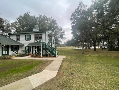 2 Bedroom and 2 Bathroom upstairs CONDO, Nestled within a on Country Club At Silver Springs Shores in Florida - for sale on GolfHomes.com, golf home, golf lot