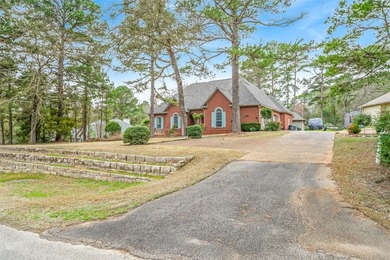 Fantastic curb appeal on this 4BD-2BA-2LA Golf Course home at on Holly Lake Ranch Golf Club in Texas - for sale on GolfHomes.com, golf home, golf lot