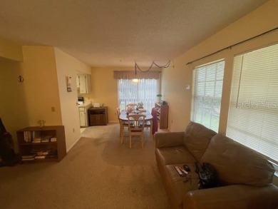 2 Bedroom and 2 Bathroom upstairs CONDO, Nestled within a on Country Club At Silver Springs Shores in Florida - for sale on GolfHomes.com, golf home, golf lot