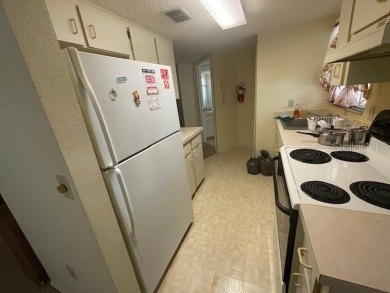 2 Bedroom and 2 Bathroom upstairs CONDO, Nestled within a on Country Club At Silver Springs Shores in Florida - for sale on GolfHomes.com, golf home, golf lot