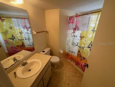 2 Bedroom and 2 Bathroom upstairs CONDO, Nestled within a on Country Club At Silver Springs Shores in Florida - for sale on GolfHomes.com, golf home, golf lot