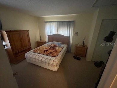 2 Bedroom and 2 Bathroom upstairs CONDO, Nestled within a on Country Club At Silver Springs Shores in Florida - for sale on GolfHomes.com, golf home, golf lot