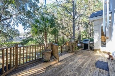 Enjoy the incredible sunset views of a large lagoon and bird on Callawassie Island Club in South Carolina - for sale on GolfHomes.com, golf home, golf lot