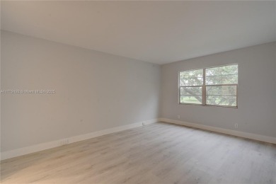 Remodeled 2 bed 2 Bath condo in the Resort Style, 55+ gated on Flamingo Lakes Country Club in Florida - for sale on GolfHomes.com, golf home, golf lot