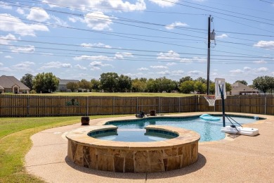 Discover the perfect blend of luxury & lifestyle in this on Pecan Plantation Country Club in Texas - for sale on GolfHomes.com, golf home, golf lot