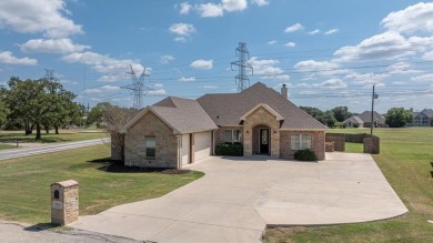 Discover the perfect blend of luxury & lifestyle in this on Pecan Plantation Country Club in Texas - for sale on GolfHomes.com, golf home, golf lot