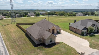 Discover the perfect blend of luxury & lifestyle in this on Pecan Plantation Country Club in Texas - for sale on GolfHomes.com, golf home, golf lot