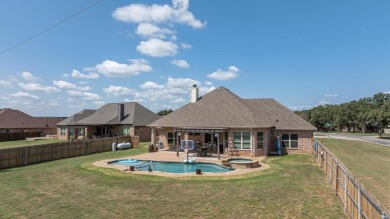 Discover the perfect blend of luxury & lifestyle in this on Pecan Plantation Country Club in Texas - for sale on GolfHomes.com, golf home, golf lot