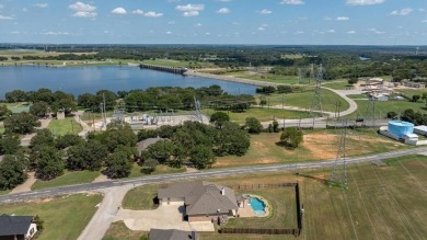 Discover the perfect blend of luxury & lifestyle in this on Pecan Plantation Country Club in Texas - for sale on GolfHomes.com, golf home, golf lot