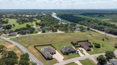 Discover the perfect blend of luxury & lifestyle in this on Pecan Plantation Country Club in Texas - for sale on GolfHomes.com, golf home, golf lot