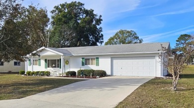 This two-bedroom, two-bath split-bedroom plan home is located in on Royal Oaks Golf Club in Florida - for sale on GolfHomes.com, golf home, golf lot