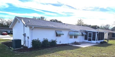 This two-bedroom, two-bath split-bedroom plan home is located in on Royal Oaks Golf Club in Florida - for sale on GolfHomes.com, golf home, golf lot