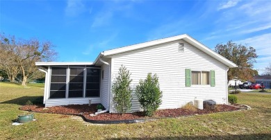 This two-bedroom, two-bath split-bedroom plan home is located in on Royal Oaks Golf Club in Florida - for sale on GolfHomes.com, golf home, golf lot