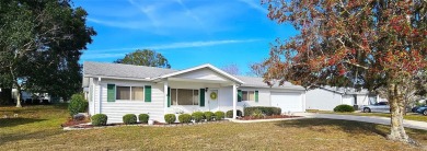 This two-bedroom, two-bath split-bedroom plan home is located in on Royal Oaks Golf Club in Florida - for sale on GolfHomes.com, golf home, golf lot