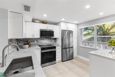Absolutely Stunning Remodel! Feel the Luxury at the prestigious on Wynmoor Golf Course in Florida - for sale on GolfHomes.com, golf home, golf lot