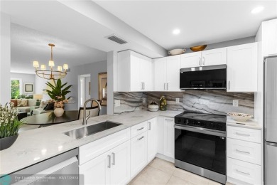 Absolutely Stunning Remodel! Feel the Luxury at the prestigious on Wynmoor Golf Course in Florida - for sale on GolfHomes.com, golf home, golf lot