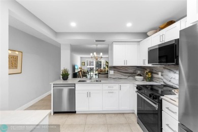 Absolutely Stunning Remodel! Feel the Luxury at the prestigious on Wynmoor Golf Course in Florida - for sale on GolfHomes.com, golf home, golf lot