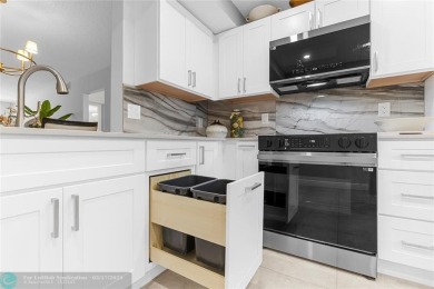 Absolutely Stunning Remodel! Feel the Luxury at the prestigious on Wynmoor Golf Course in Florida - for sale on GolfHomes.com, golf home, golf lot