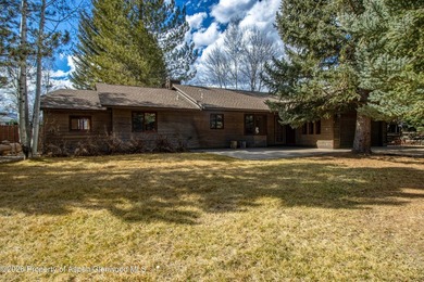 Welcome to The Ranch at Roaring Fork! This home offers one level on Ranch at Roaring Fork Golf Course in Colorado - for sale on GolfHomes.com, golf home, golf lot