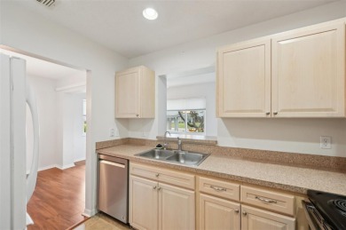 Discover comfort and convenience in this lovely 2-bedroom on Kings Point Executive Golf Course in Florida - for sale on GolfHomes.com, golf home, golf lot