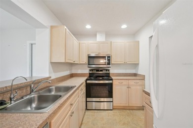 Discover comfort and convenience in this lovely 2-bedroom on Kings Point Executive Golf Course in Florida - for sale on GolfHomes.com, golf home, golf lot