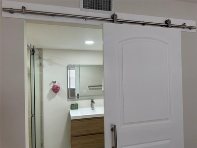 Beautifully renovated condo located in the desirable gated on Sunrise Lakes Phase IV Golf Course in Florida - for sale on GolfHomes.com, golf home, golf lot