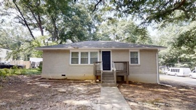 Welcome to this beautifully updated 3-bedroom, 1-bath ranch on Browns Mill Golf Course in Georgia - for sale on GolfHomes.com, golf home, golf lot
