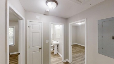 Welcome to this beautifully updated 3-bedroom, 1-bath ranch on Browns Mill Golf Course in Georgia - for sale on GolfHomes.com, golf home, golf lot