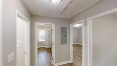 Welcome to this beautifully updated 3-bedroom, 1-bath ranch on Browns Mill Golf Course in Georgia - for sale on GolfHomes.com, golf home, golf lot