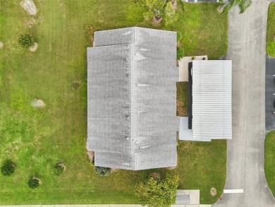 Discover comfort and convenience in this lovely 2-bedroom on Kings Point Executive Golf Course in Florida - for sale on GolfHomes.com, golf home, golf lot