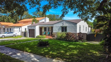 Located in the heart of Miami Springs, this charming home offers on Miami Springs Golf and Country Club in Florida - for sale on GolfHomes.com, golf home, golf lot