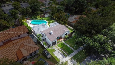 Located in the heart of Miami Springs, this charming home offers on Miami Springs Golf and Country Club in Florida - for sale on GolfHomes.com, golf home, golf lot