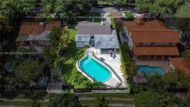 Located in the heart of Miami Springs, this charming home offers on Miami Springs Golf and Country Club in Florida - for sale on GolfHomes.com, golf home, golf lot