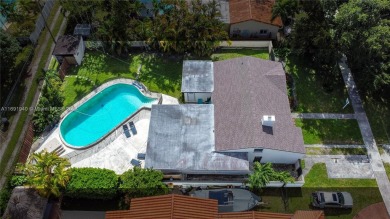 Located in the heart of Miami Springs, this charming home offers on Miami Springs Golf and Country Club in Florida - for sale on GolfHomes.com, golf home, golf lot