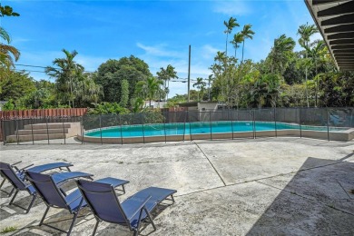 Located in the heart of Miami Springs, this charming home offers on Miami Springs Golf and Country Club in Florida - for sale on GolfHomes.com, golf home, golf lot