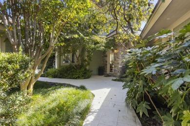 Welcome to this luxurious, Frank Lloyd Wright-inspired home in on Country Club of Landfall in North Carolina - for sale on GolfHomes.com, golf home, golf lot