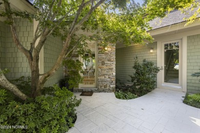 Welcome to this luxurious, Frank Lloyd Wright-inspired home in on Country Club of Landfall in North Carolina - for sale on GolfHomes.com, golf home, golf lot